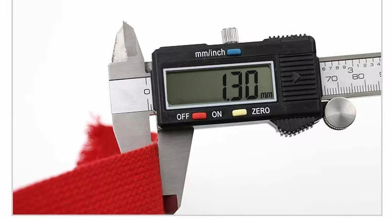 Digital caliper measuring the thickness of the webbing at 1.30 mm