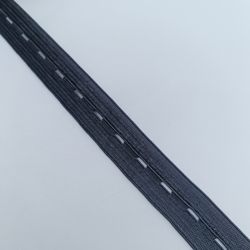 Close view of latex and polyester elastic tape for adjustable garment waistbands