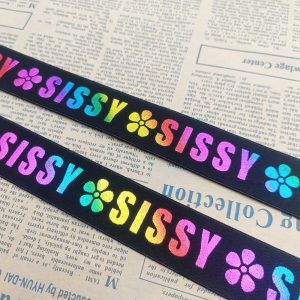 Custom laser printed elastic band in black with rainbow lettering and floral motifs